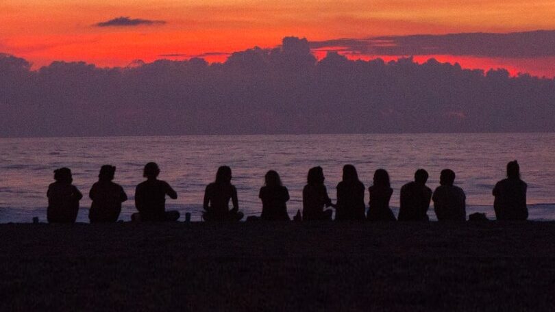 womens circle watching sunset